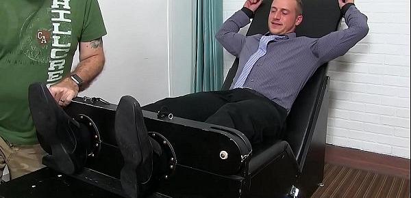  Kenny is tied up while wearing a business suit and tickled